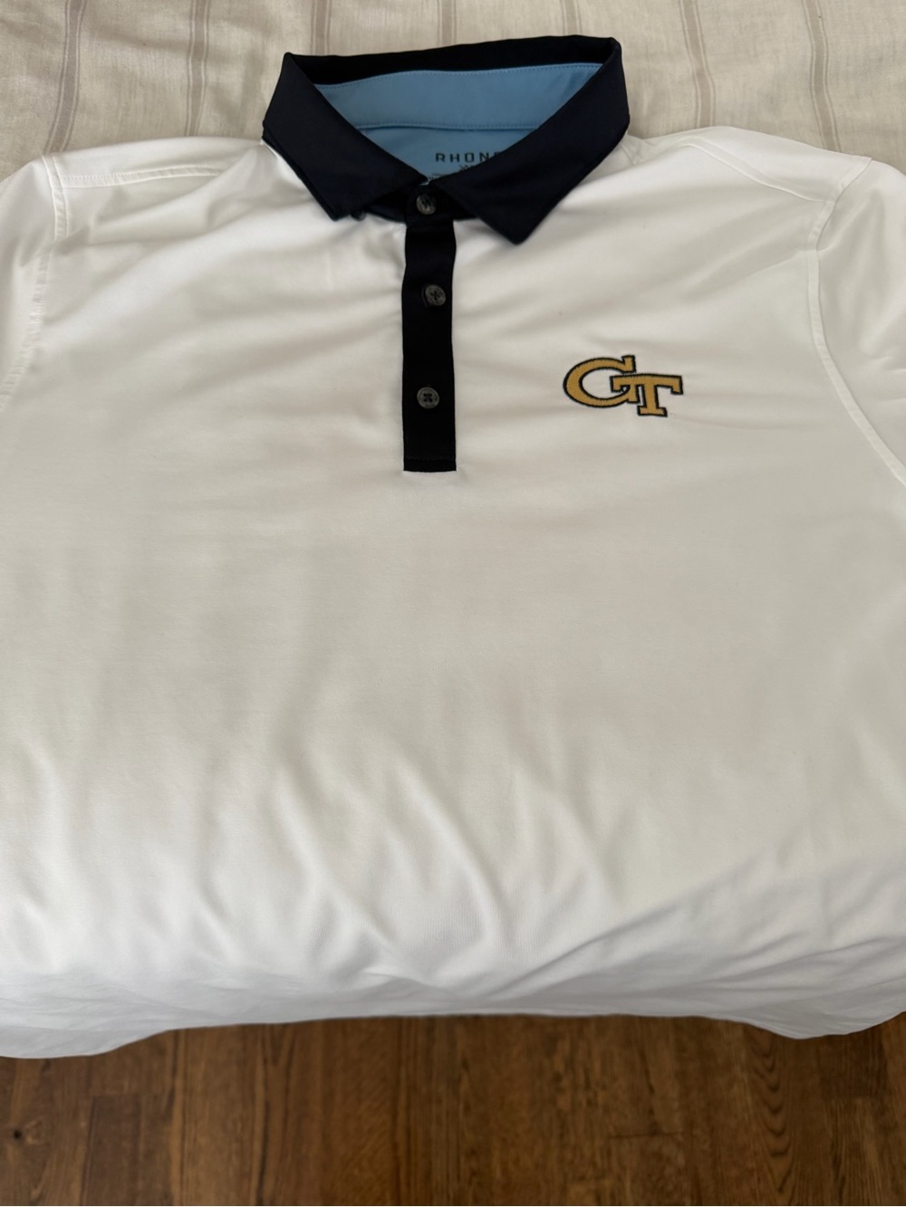 RHONE White Polo with Black Collar and Gold GT Emblem